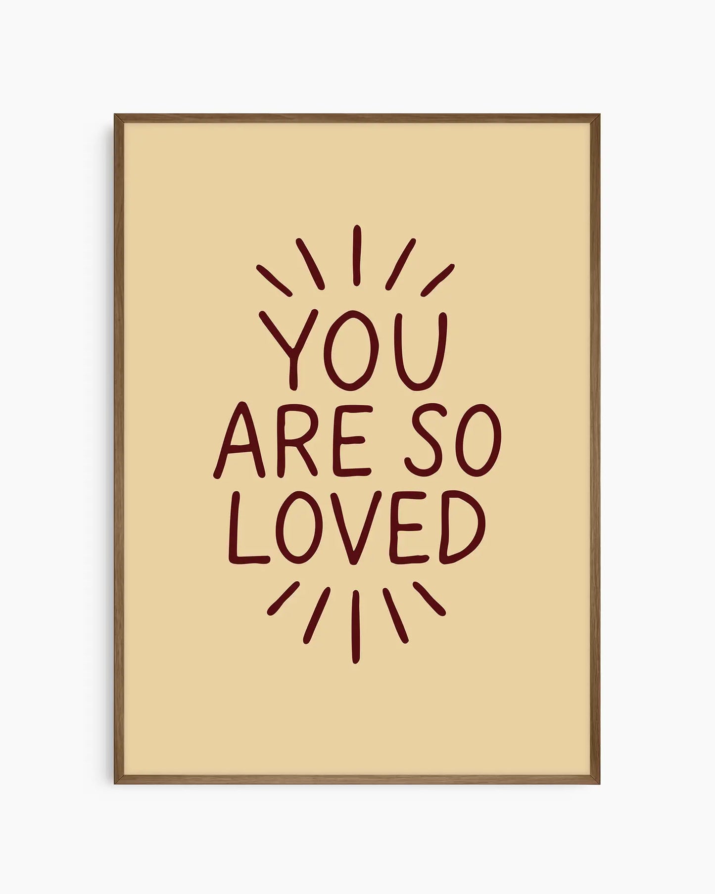 Children's poster with 'You are so loved' text framed in a dark oak frame.