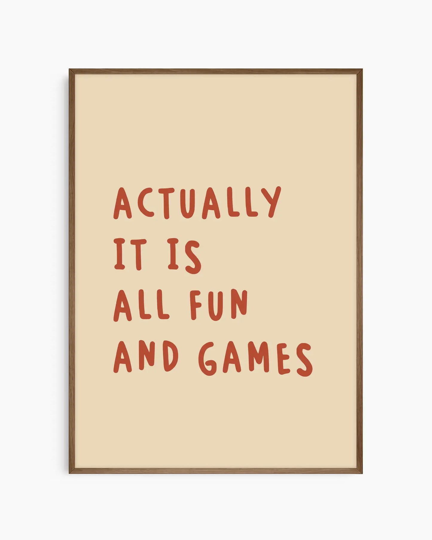 Beige nursery poster with the text 'Actually it is all fun and games'  framed in a dark oak frame