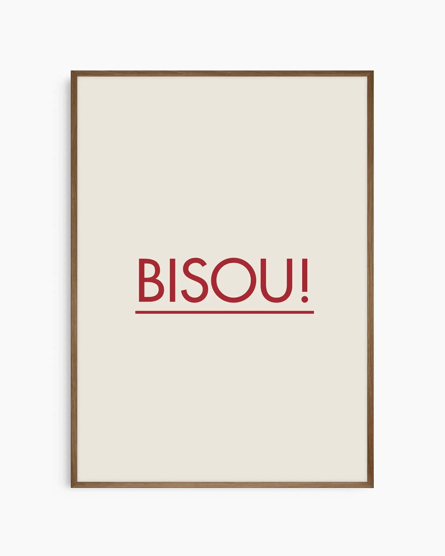 Framed poster with red 'BISOU!' text on a white background, framed in a smoked oak wooden frame.