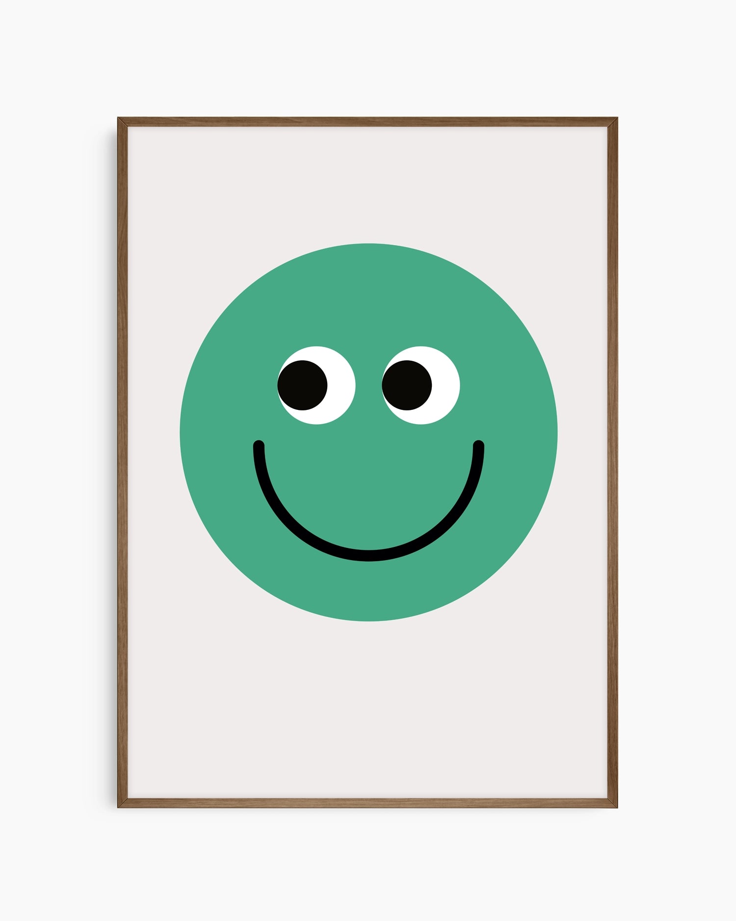 Framed poster with a green smiley face on a white background