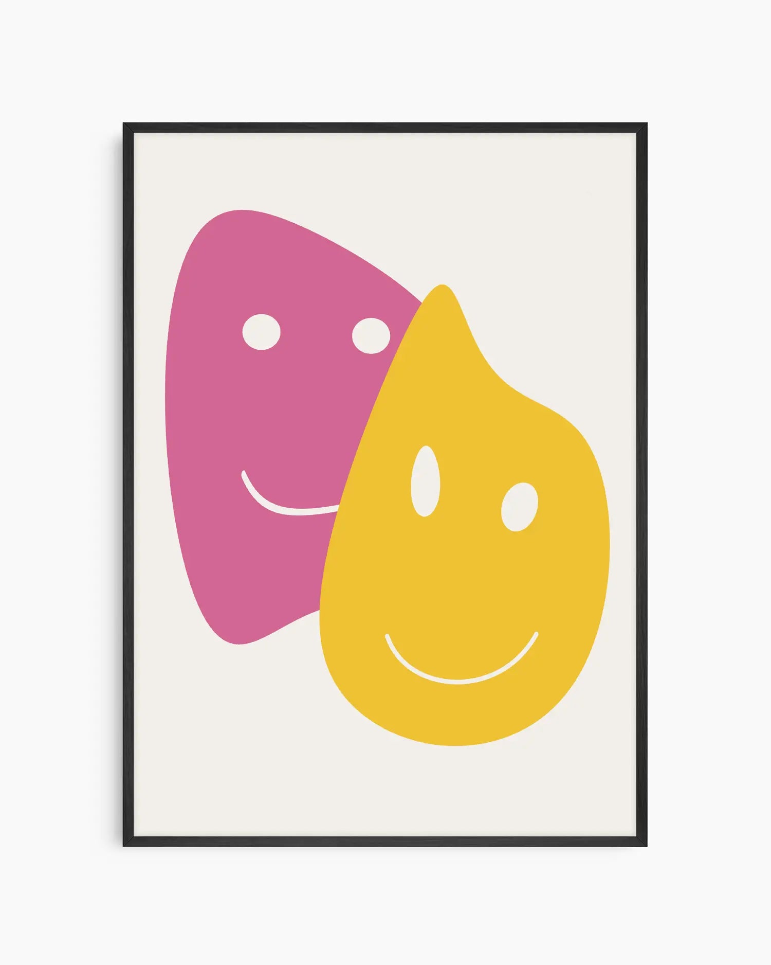 Framed artwork with two colorful smiley faces, one pink and one yellow, on a white background.