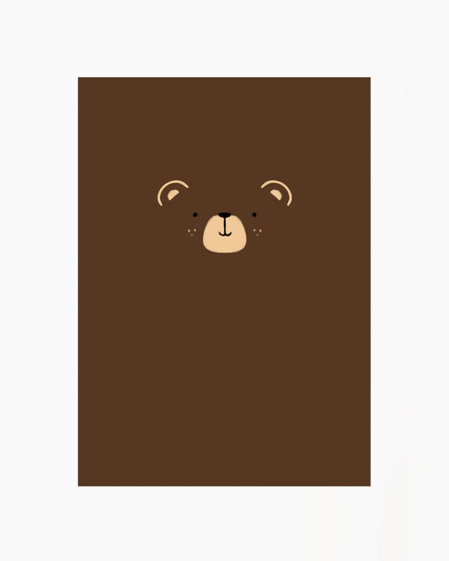 Brown notebook with a bear face design on a white background