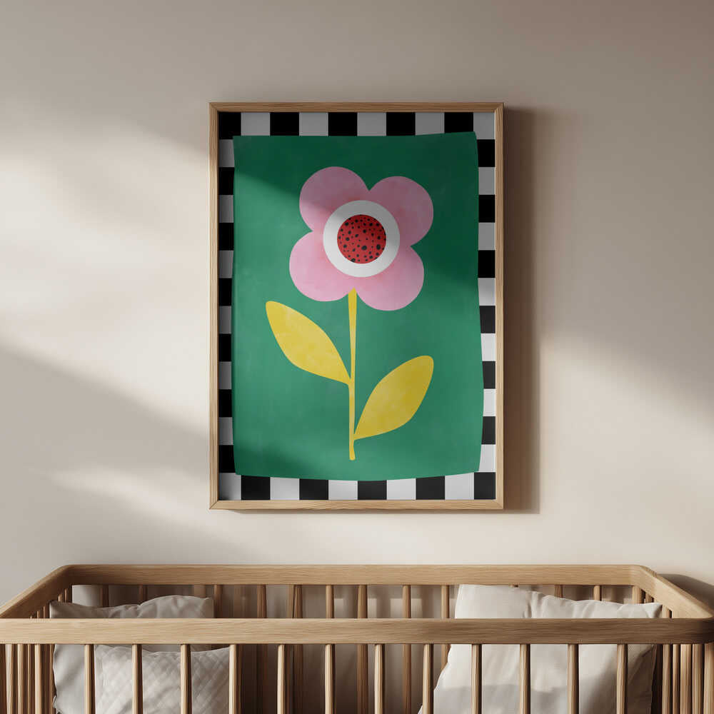 Poster of a big pink, red, white and yellow flower on a green background and white and black stripes surrounding it like a frame hanging above the baby's crib