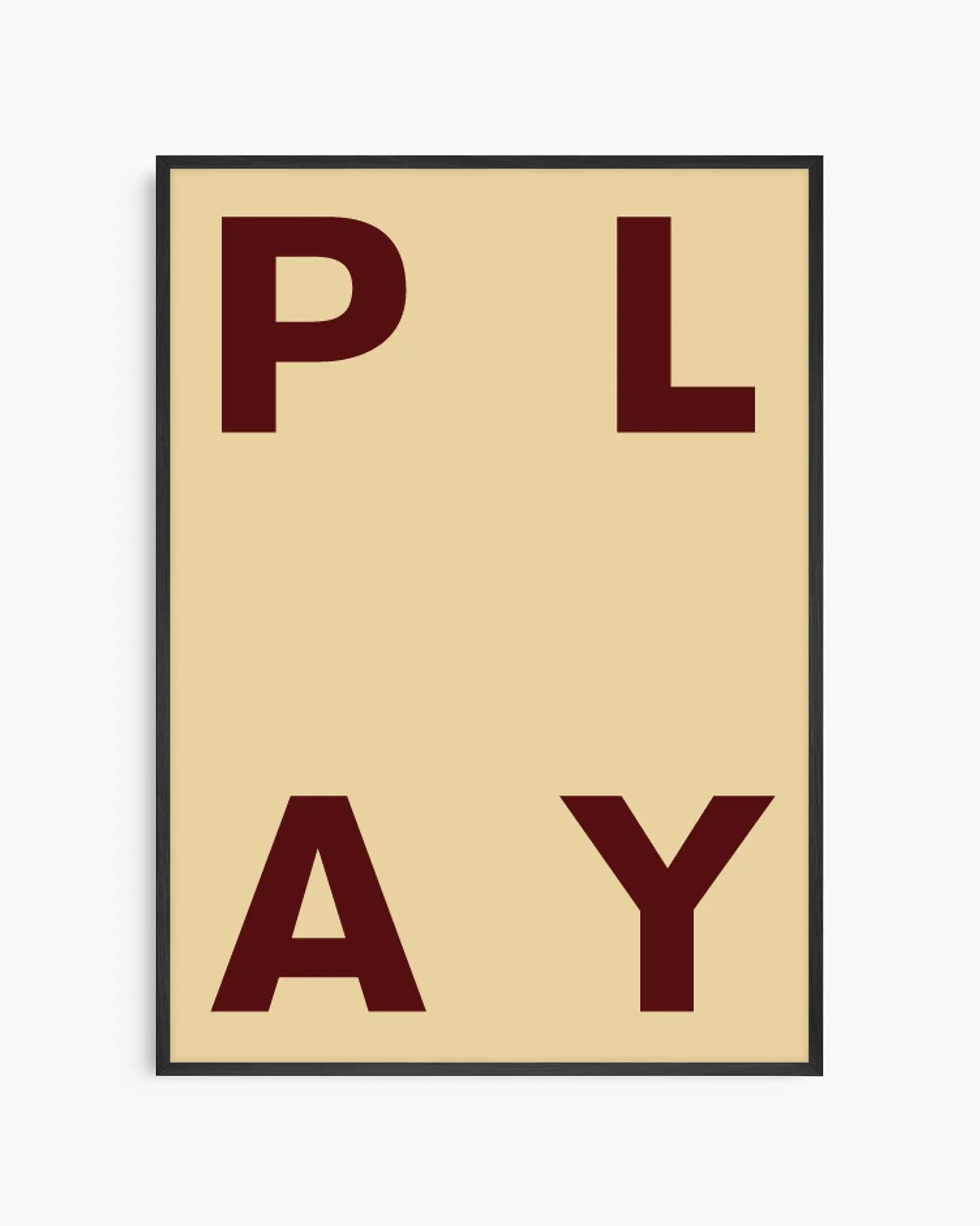 Beige nursery poster with maroon letters spelling 'PLAY' on a beige background framed in a black frame.