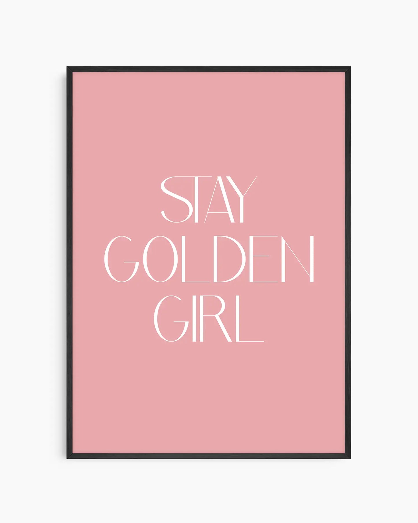 Nursery poster with 'Stay Golden Girl' text on a pink background framed in a black frame