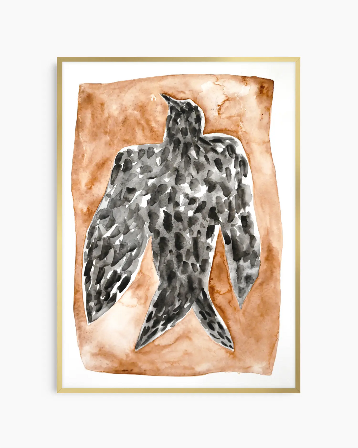 Artwork for the nursery of a black falcon on a brown background framed in a golden frame.