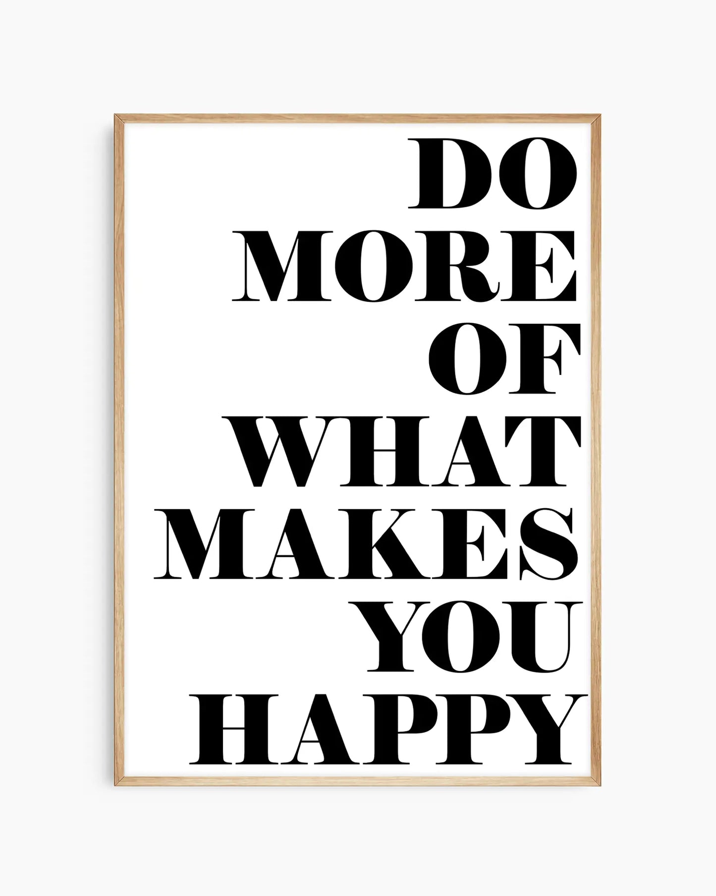 Motivational nursery poster with the text 'Do more of what makes you happy' written on a white background framed in an oak frame