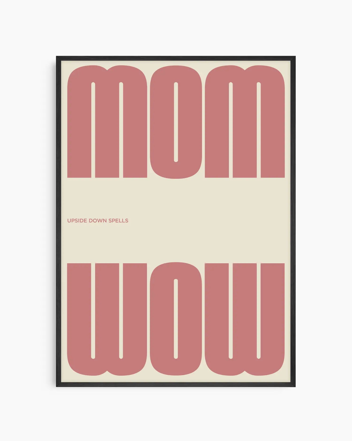 Poster with the pink text 'MOM upside down spells WOW' in a minimalistic design on a beige background, framed in a black wooden frame. 