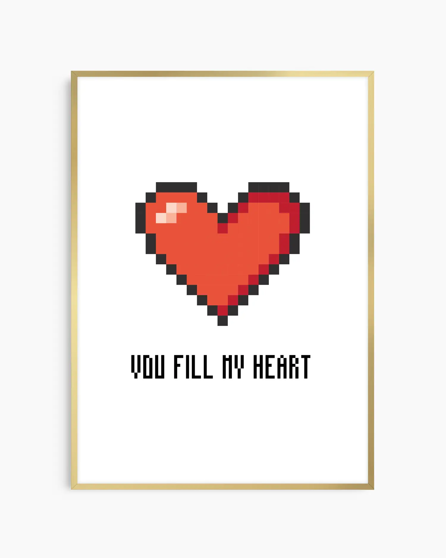 Nursery poster with a red pixel heart and the text 'You Fill My Heart' text on a white background, framed in a golden aluminium frame.