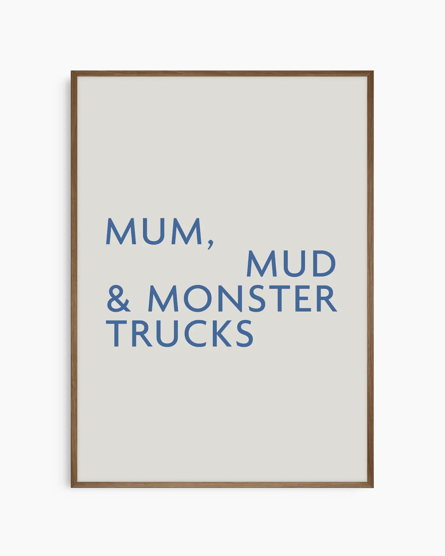 Poster with text 'Mum, Mud & Monster Trucks' in a dark wooden oak frame.