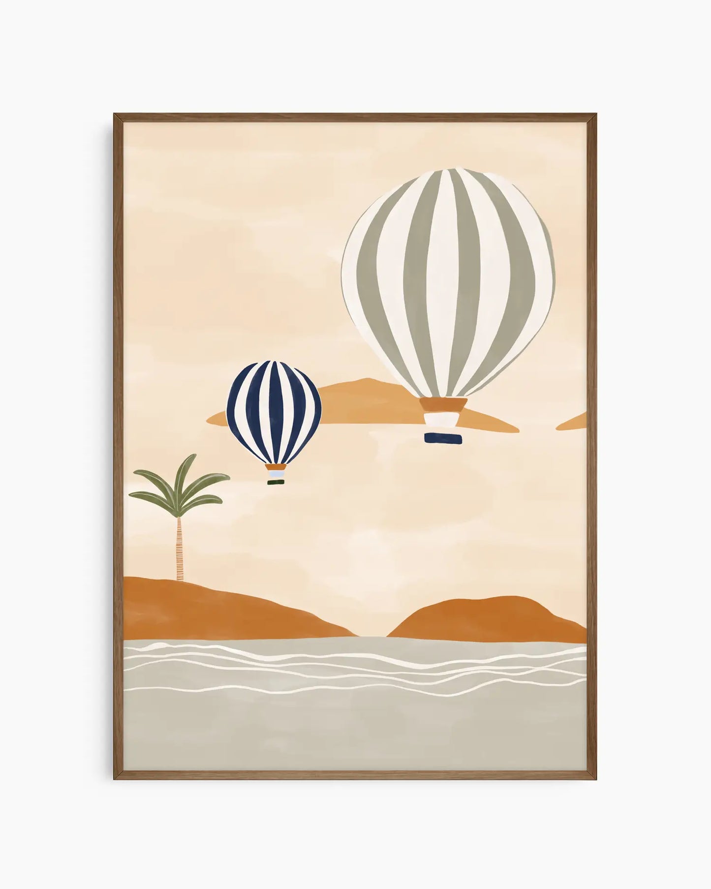 Framed artwork of two hot air balloons over a desert landscape with palm trees and mountains.