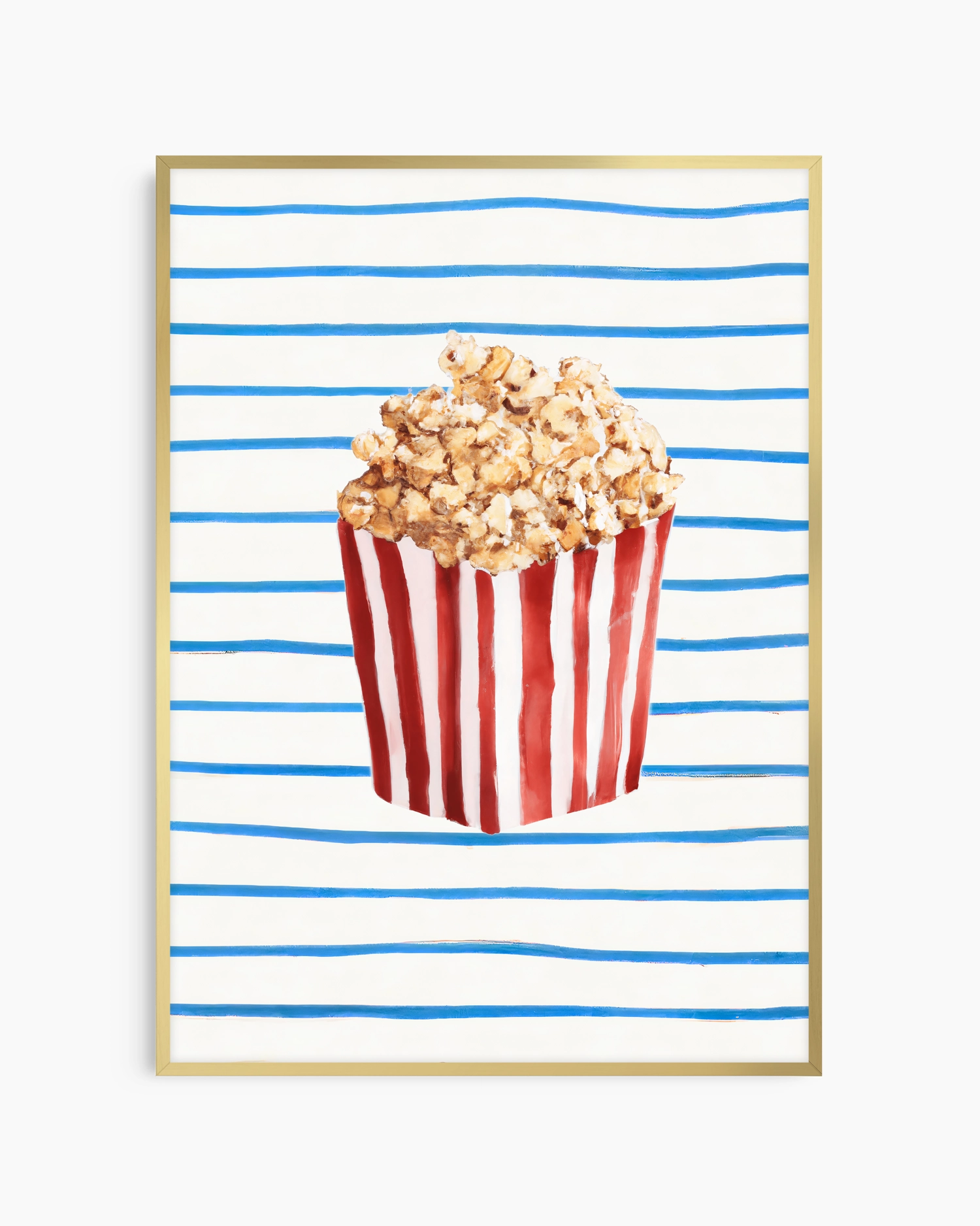 Popcorn in a red and white striped bucket on a blue and white striped background