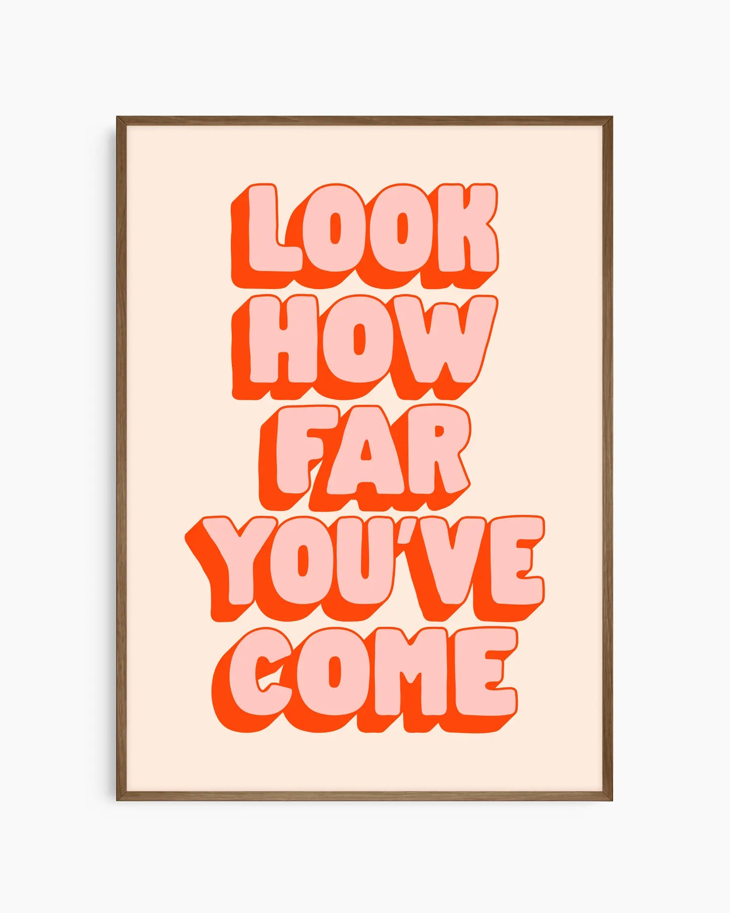 Framed poster with motivational quote 'Look how far you've come' in bold red letters on a beige background