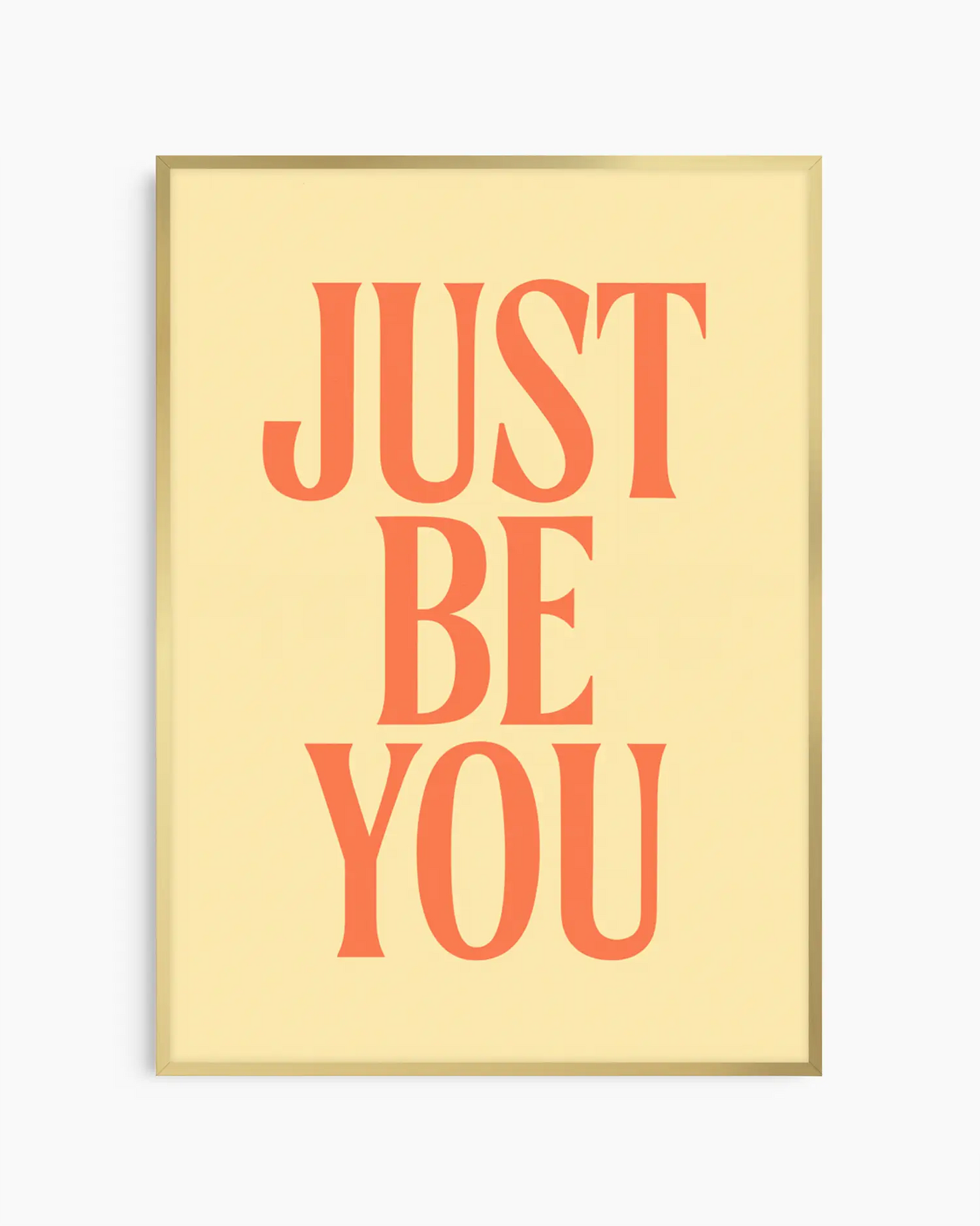 Framed poster with 'JUST BE YOU' text on a light yellow background
