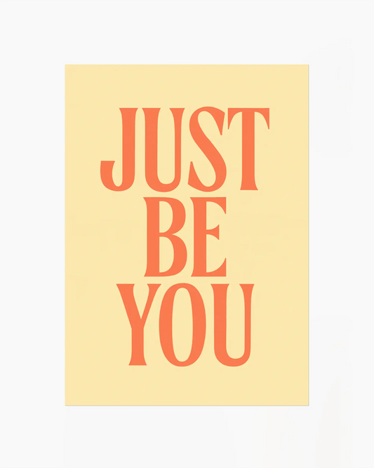 Motivational poster with 'JUST BE YOU' text on a yellow background