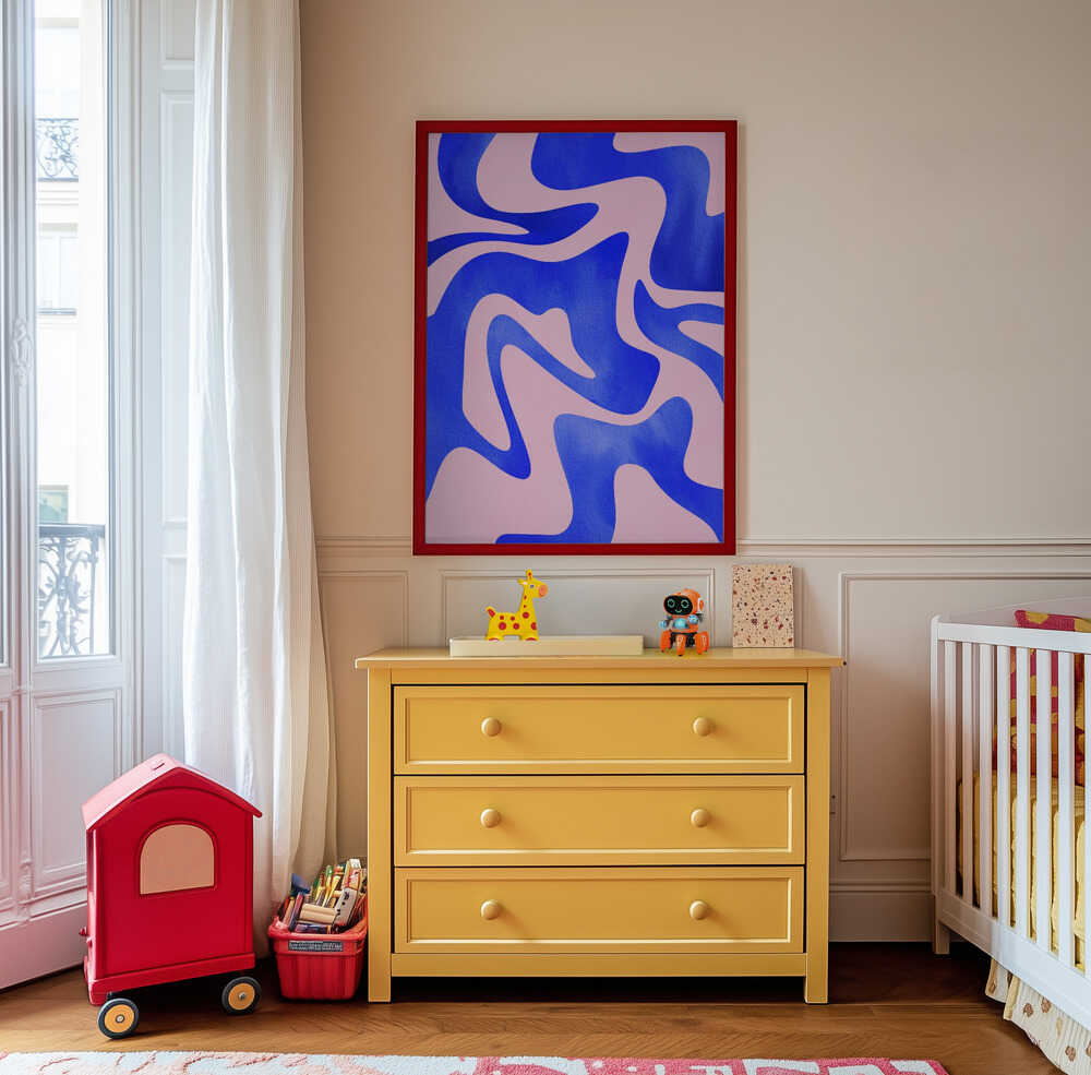 Colorful abstract wall art in bright blue and pink, hanging above a yellow dresser in a cheerful kids’ room. A playful and creative art print that brings energy and color to modern children’s interiors.